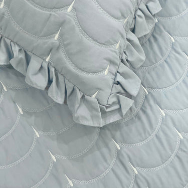 Blue 3-piece quilted bedcover set with frilled pillow covers | frills view