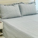 Blue 3-piece quilted bedcover set with frilled pillow covers | right side view
