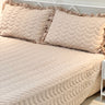 Brown 3-piece quilted bedcover set with frilled pillow covers overall view
