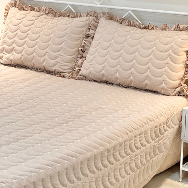 Brown 3-piece quilted bedcover set with frilled pillow covers overall view