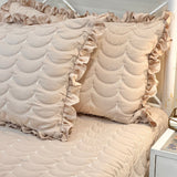Brown 3-piece quilted bedcover set with frilled pillow covers side view