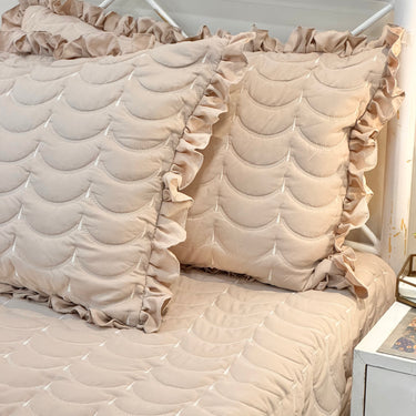 Brown 3-piece quilted bedcover set with frilled pillow covers side view