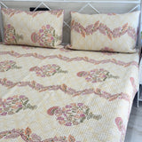 Cream floral buta jaipuri print quilted bedcover | side view