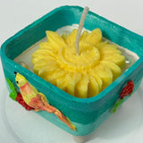 Handcrafted Bird & Flower Cement Candle | Turquoise Teal Holder with Yellow Bloom Candle Overall view