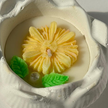 Handcrafted Floral Soy Candle | Yellow Blossom Candle with Botanical Accents Closeup view