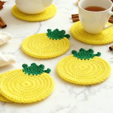 Handmade Pineapple Crochet Coasters (Set of 6) | Bright Tropical Cotton Coasters for Summer Décor Closeup view.