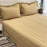 brown quilted bedcover with frills | overall view